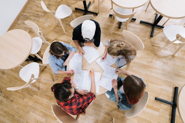 students-table-with-notepads